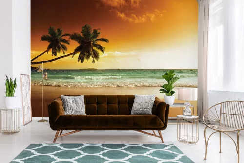 Benyúló pálmafák a tengerparti naplementében poszter, fotótapéta