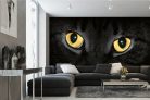 Vlies Fotótapéta - Yellow cat eyes glowing in dark - 375x250 cm