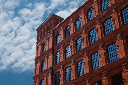 Vlies Fotótapéta - Brick building - 375x250 cm