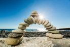 Vlies Fotótapéta - Bridge of stone on beach - 375x250 cm