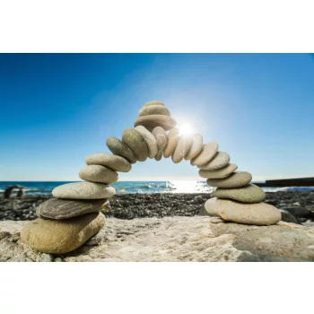 Vlies Fotótapéta - Bridge of stone on beach - 375x250 cm