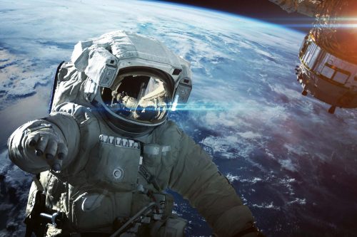 Vlies Fotótapéta - Astronaut in space - 375x250 cm