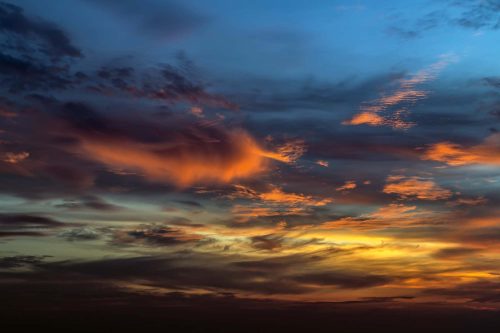 Vlies Fotótapéta - Cloudy sunset - 375x250 cm