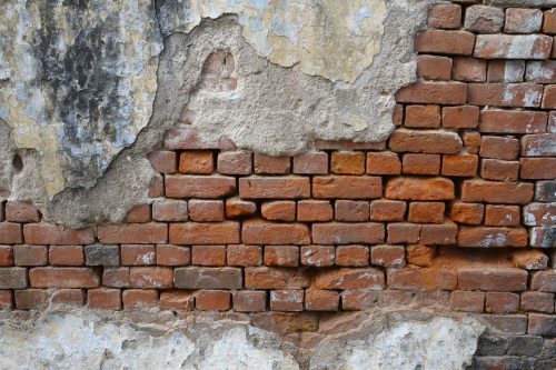 Vlies Fotótapéta - Old brick wall partially damaged - 375x250 cm