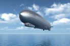 Vlies Fotótapéta - Airship over the ocean - 375x250 cm