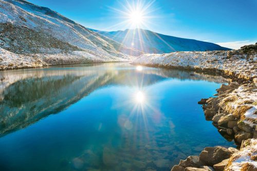 Vlies Fotótapéta - Blue lake in the mountains - 375x250 cm