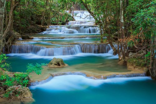 Vlies Fotótapéta - Deep Forest Waterfall - 375x250 cm